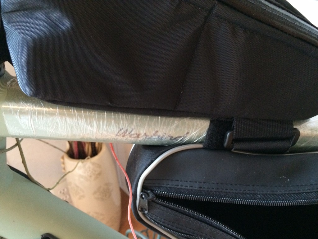 Protecting bike frame paint from touring bag straps
